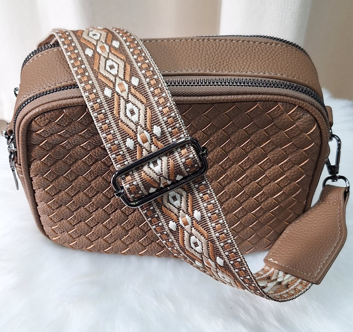 Tas L